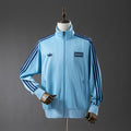 Camiseta Oasis Chaqueta Celeste Adultos